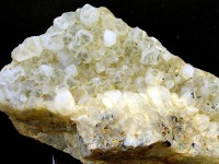 Agregado de cristales de cuarzo con predominio de uno de los trapezoedros (acabado en tres caras). Portm�n 