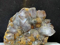 Cristales de cuarzo recubiertos de siderita de Llano del Beal 