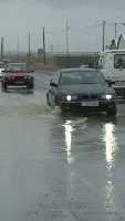 Trfico y coches durante la lluvia