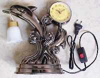lmpara-reloj delfines (Al pulsar se abrir la foto en una nueva ventana.)
