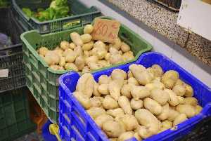 Patatas en el mercado [Patata]