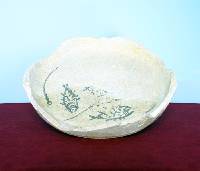 Manganese painted pottery dish