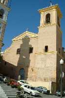 Fachada y Torre de la Iglesia de San Miguel. Se ve un poco de la Torre del Reloj